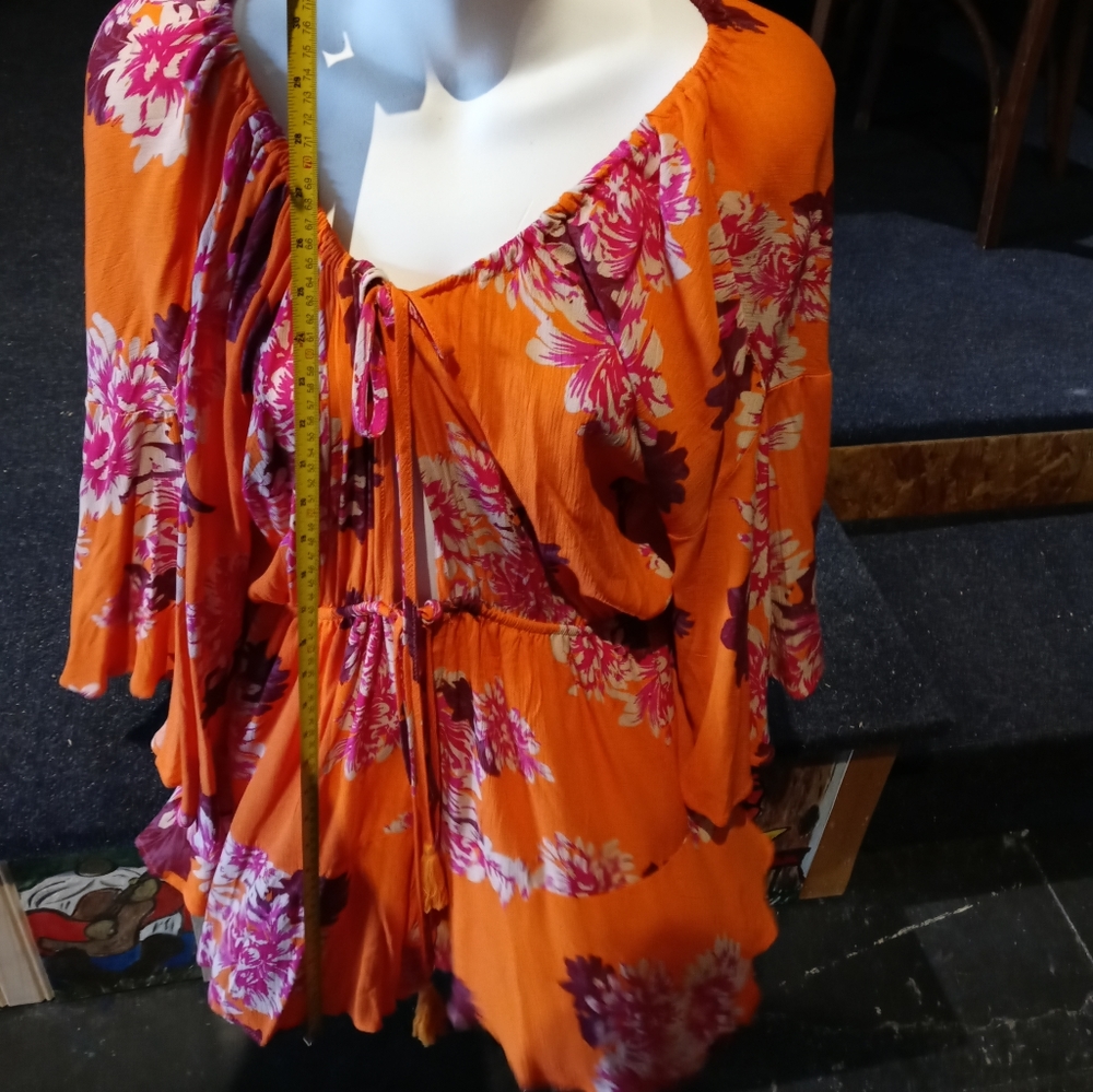 ER1. Orange Floral Flowy Romper Size M/L
